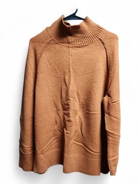 Women's oversized mockneck sweater. Rust